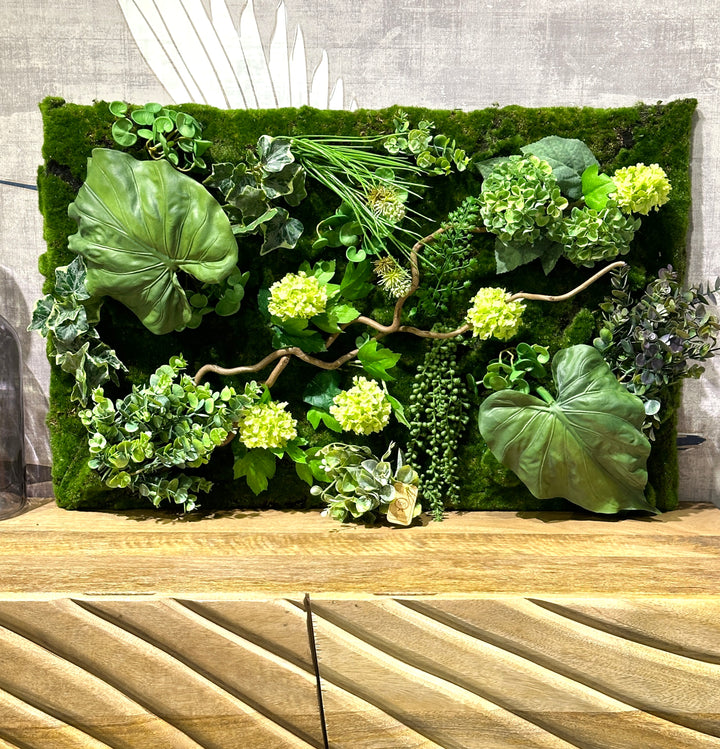 QUADRO VEGETALE COMPOSTO CON BASE DI MUSCHIO ARTIFICIALE E APPLICAZIONE DI FOGLIAME ARTIFICIALE DI ALTA QUALITÀ CON INSERTO DI NOCCIOLO CONTORTO-DIMENSIONE 80x50